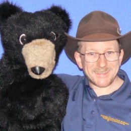 Kevin Pittman with a bear puppet